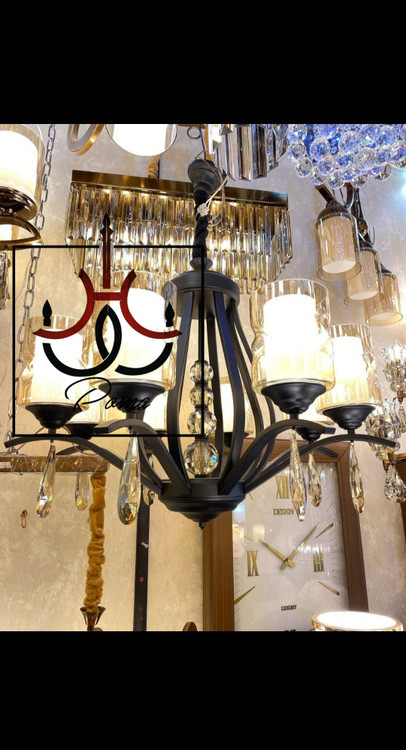 لوستر مشکی مدل غنچه با طراحی مدرن لهستانی و نوردهی مناسب فضای سالن و پذیرایی