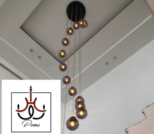 لوستر مولکولی آبشاری طبقاتی بلند مناسب دوبلکس و راهپله، طراحی خاص و شیک از برند رومالوستر