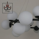 لوستر مولکولی گرد مشکی ۱۵ شعله با طراحی مدرن و نوردهی بالا مناسب فضاهای مختلف