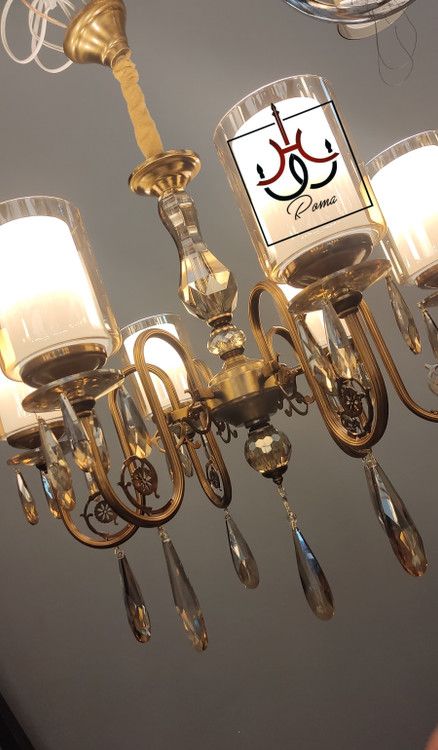 لوستر بهار ۶ شاخه با آویز کریستالی شفاف و طراحی مدرن مناسب فضاهای پذیرایی و نشیمن