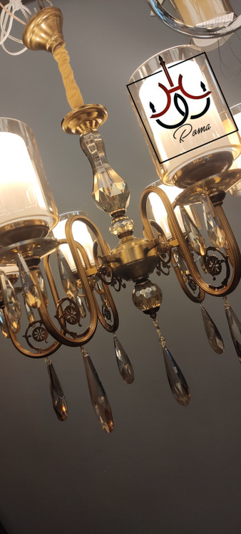 لوستر بهار ۶ شاخه با آویز کریستالی شفاف و طراحی مدرن مناسب فضاهای پذیرایی و نشیمن